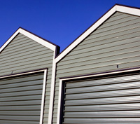 Two buildings with garage doors