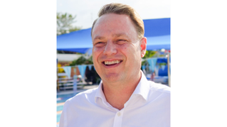 A portrait image of Lord Mayor Adrian Schrinner.