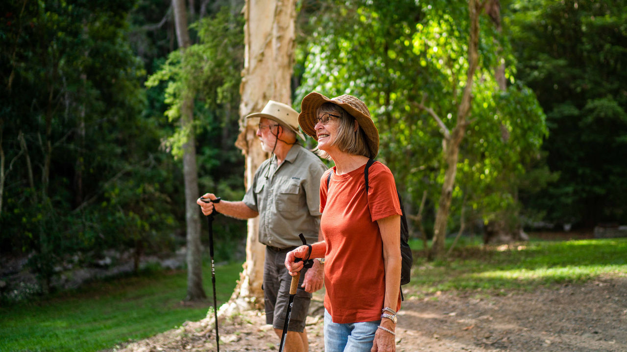 Elderly couple hiking in the Mt Coot-tha forest