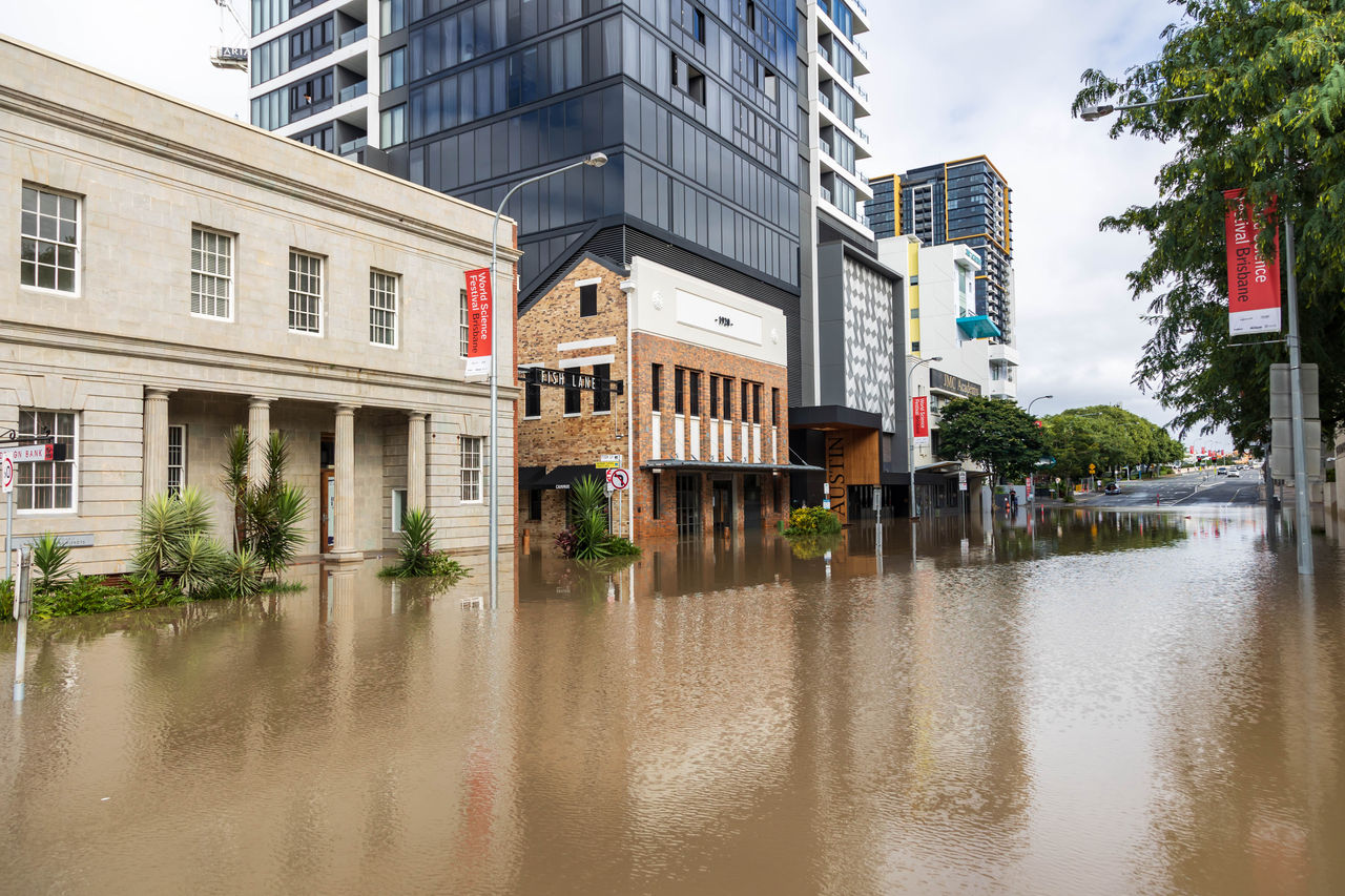 Flooding in Fish Lane, Brisbane. Streets flooded with water reaching up to the ground floor of buildings