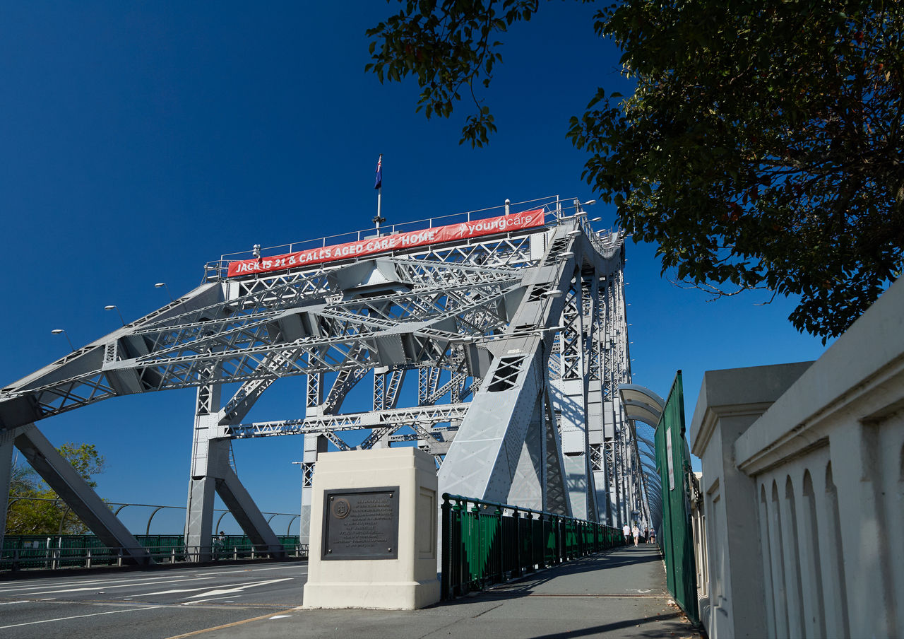 'Jack is 21 and calls aged care home | Youngcare' banner on northern end of Story Bridge.