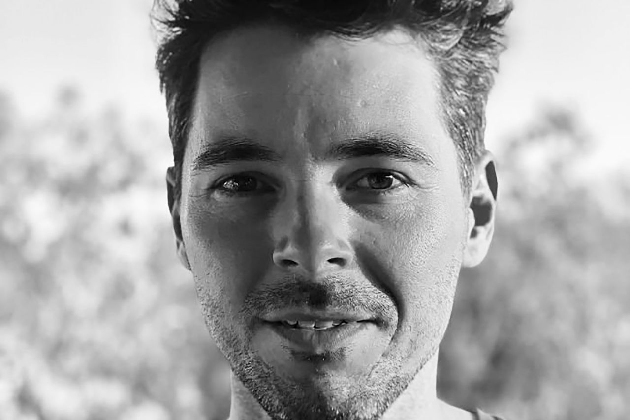 Portrait head shot of Fergus Jenkins, mentor for The QUBE Effect 2026. In black and white.