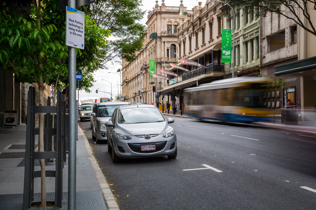 On-street parking and traffic along Elizabeth Street, Brisbane City, near Uptown.