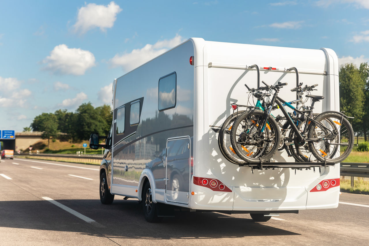 RV (recreational vehicle) on highway.