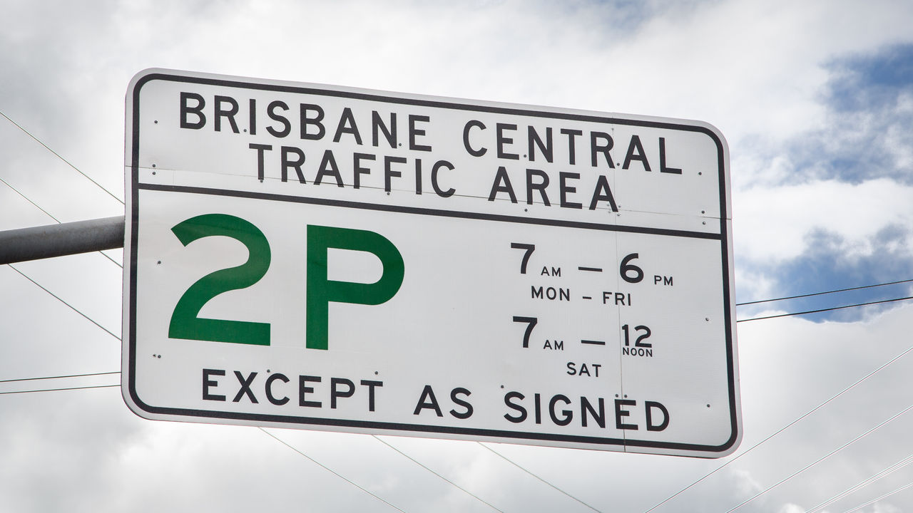 Brisbane central traffic area 2P road sign. Applies 7am-6pm Monday to Friday and 7am to 12 noon Saturday, except as signed.