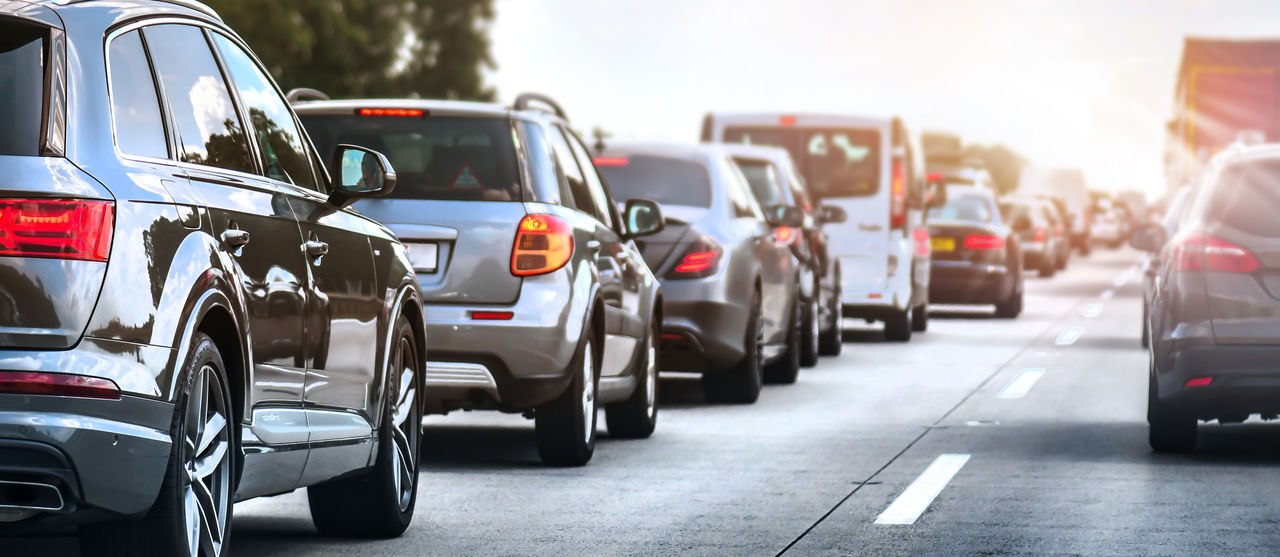 Two lanes of vehicle traffic during peak hour
