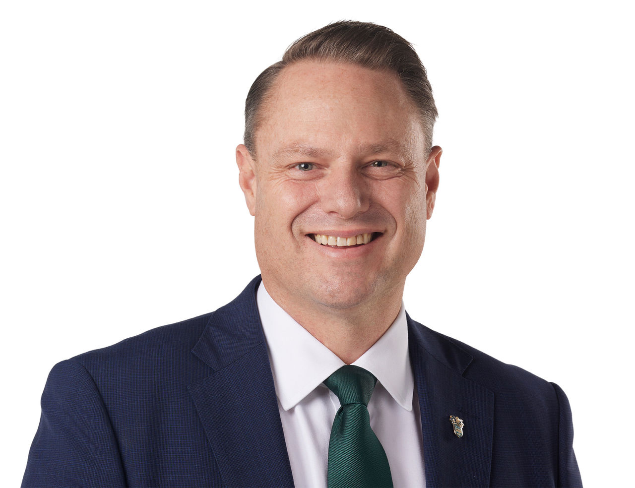 Portrait of Lord Mayor Adrian Schrinner looking at camera.