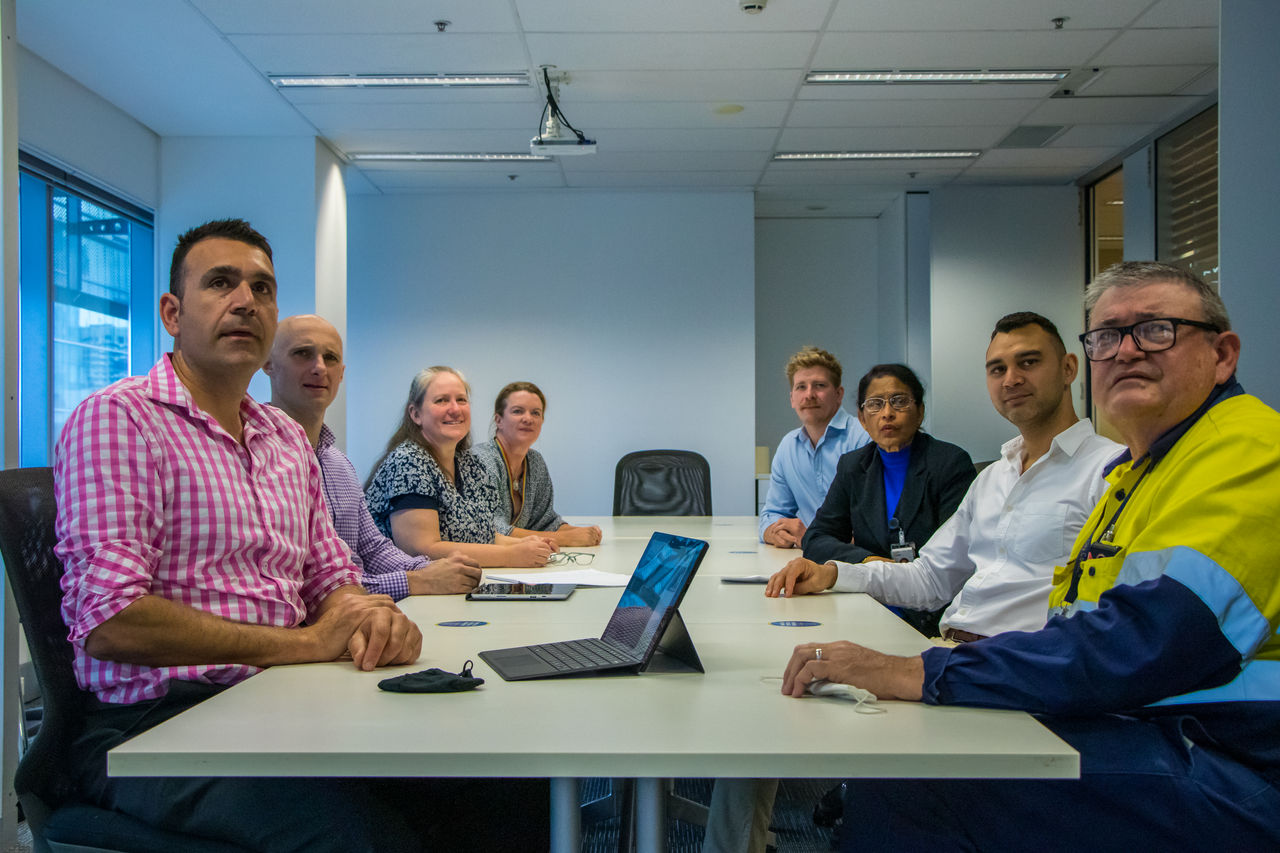 Council office-based staff in a Council meeting room.