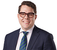 Portrait of Councillor Ryan Murphy looking at camera.