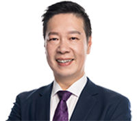 Portrait of Councillor Steven Huang looking at camera.