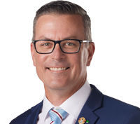 Portrait of Councillor Steve Toomey looking at camera.