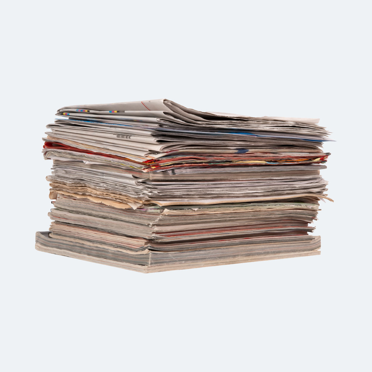 A stack of newspapers and cardboard.
