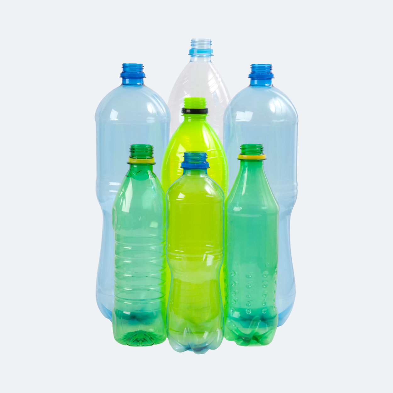 A group on multi - coloured plastic bottles.