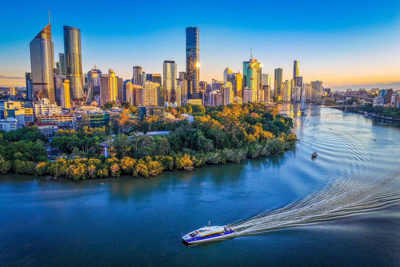 LMPA 2026 Peoples Choice Finalist - Rebecca Hassett - The morning commute. A City Cat ferry moving along the Brisbane River with the city skyline behind.