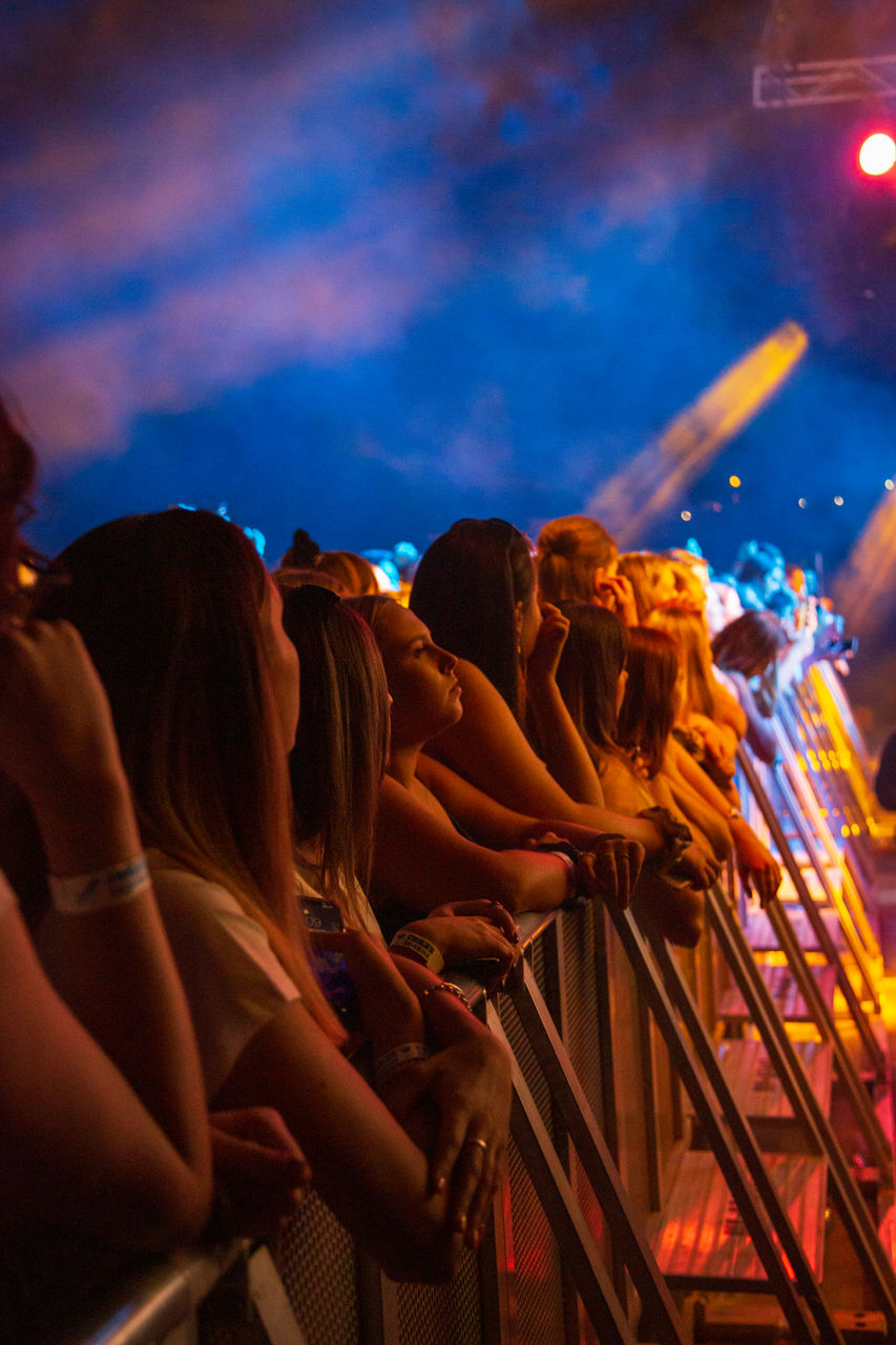Crowd cheering at the event or festival
