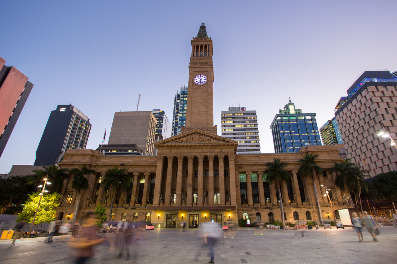 Brisbane City Hall viewed from King George Square at twilight.