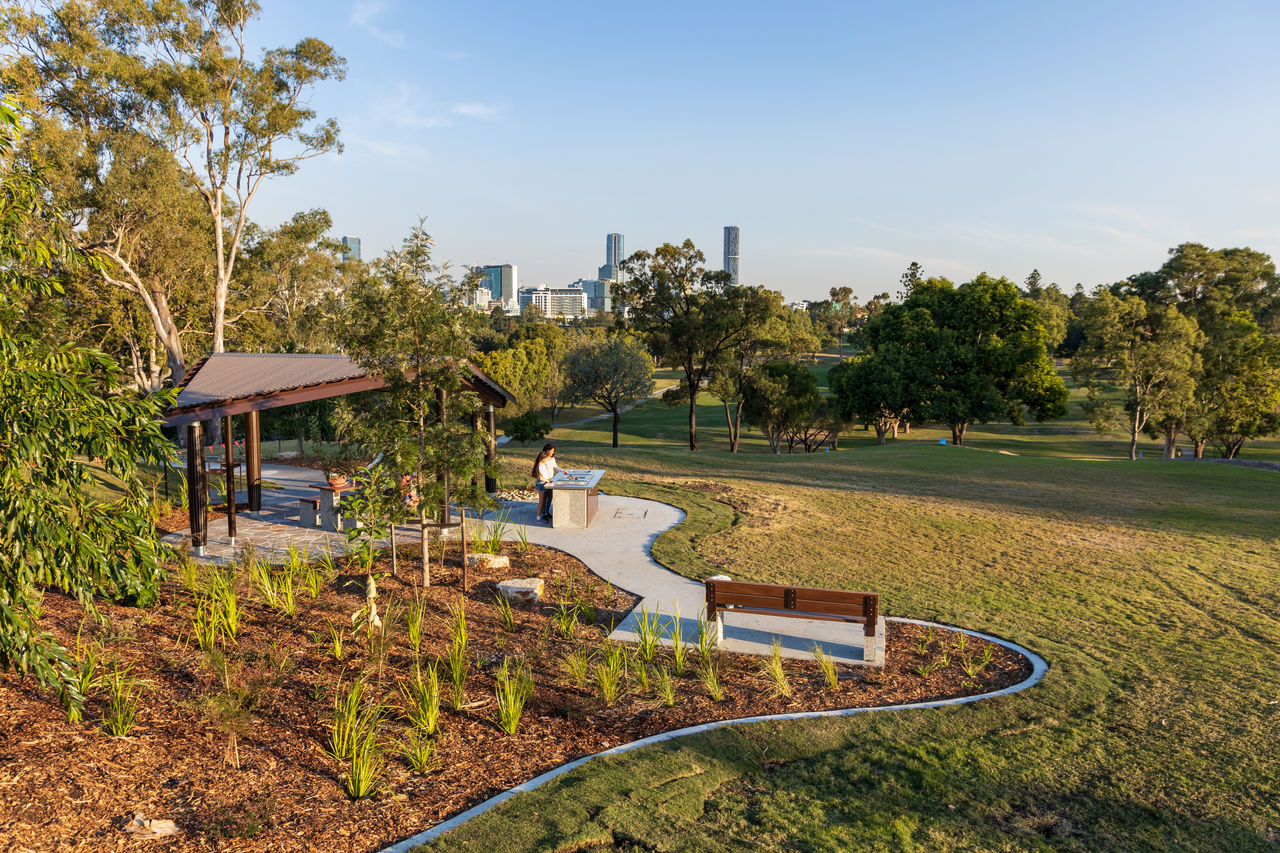 A picnic shelter and barbecue area overlooking the lawns in Victoria Park.
