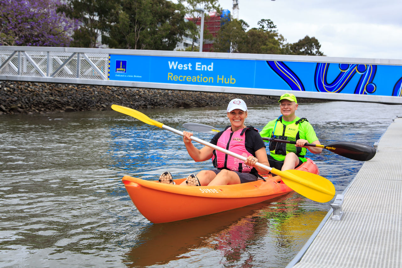 Kayakers pulling away from West End Recreation Hub.