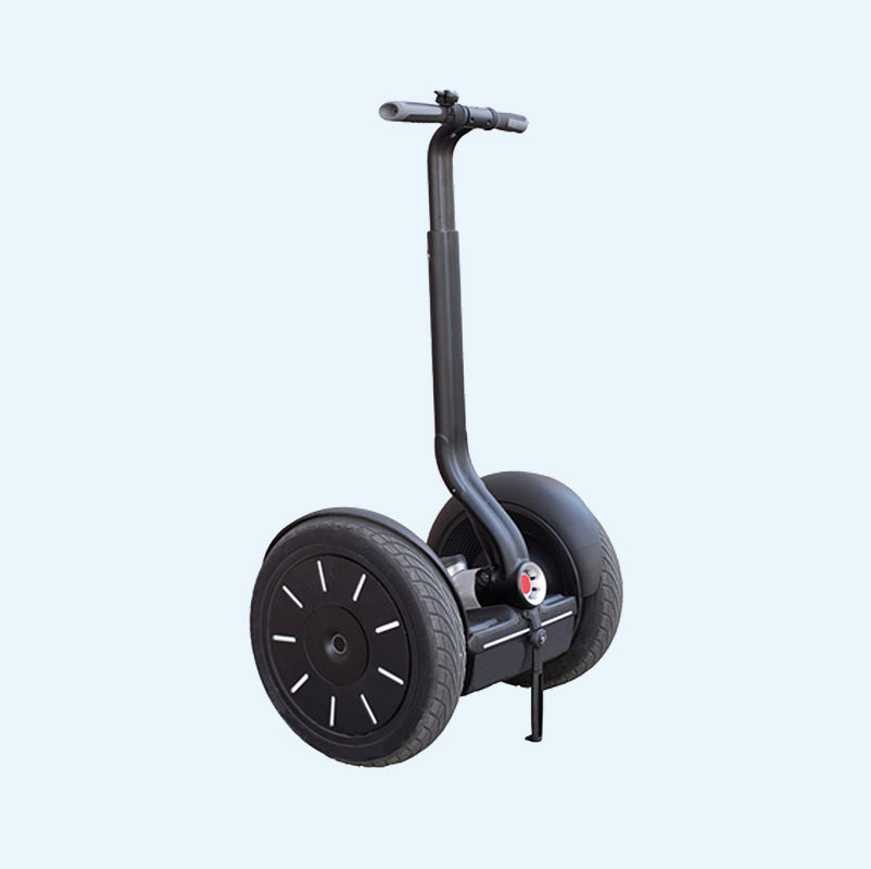 Black electric Segway two wheel with handles on a blue background.