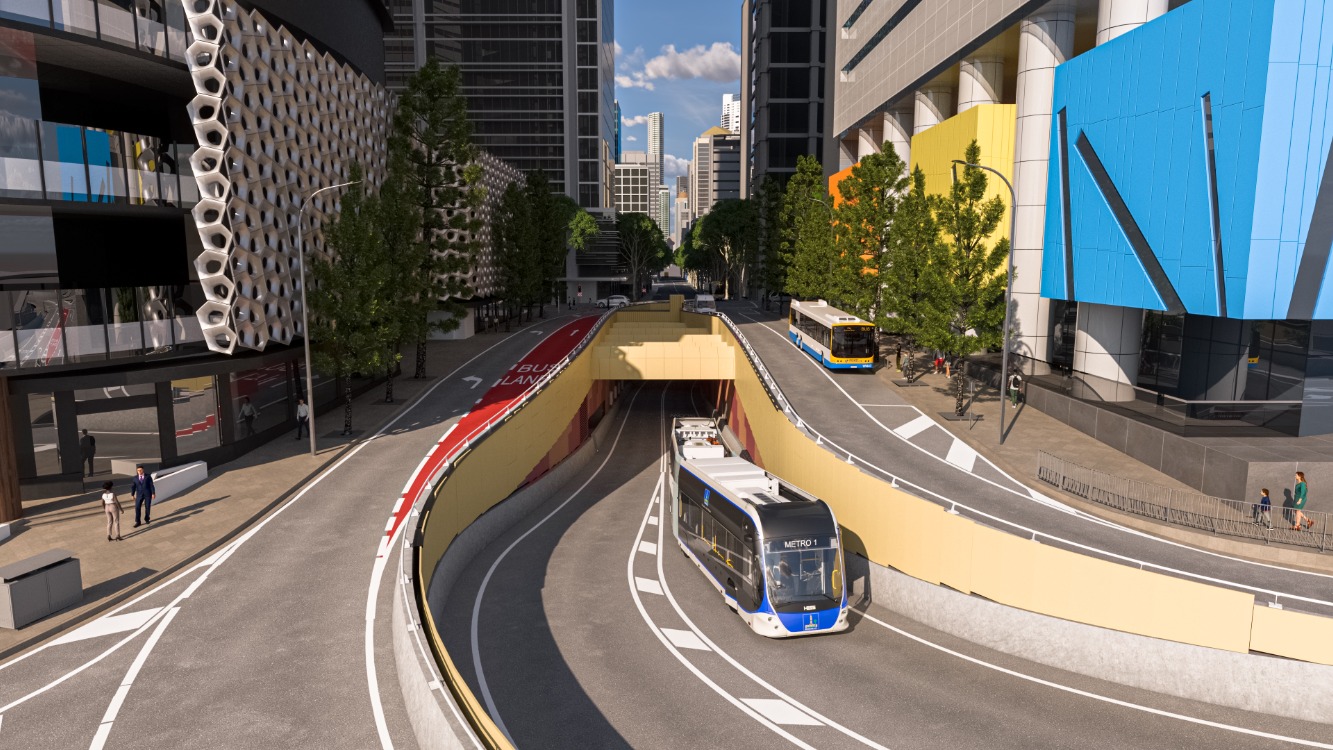 An image of a Brisbane Metro driving out of the Adelaide Street Tunnel. 