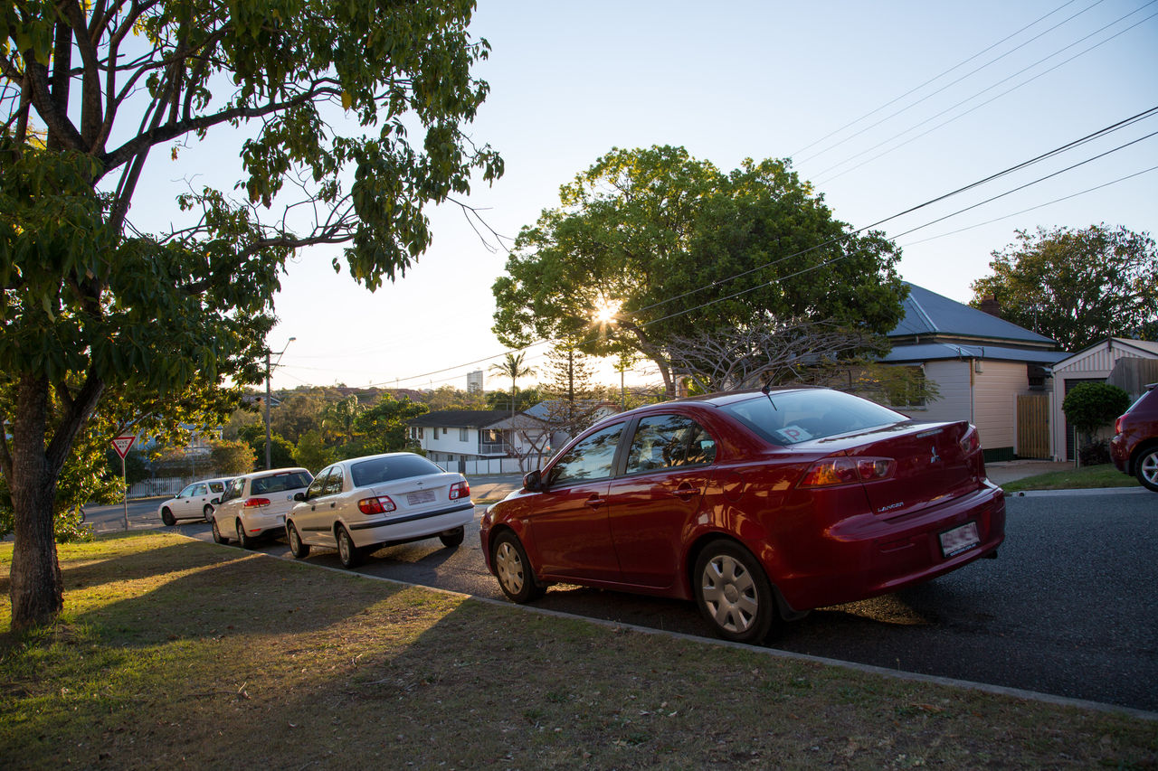 Cars parked in a residential street.