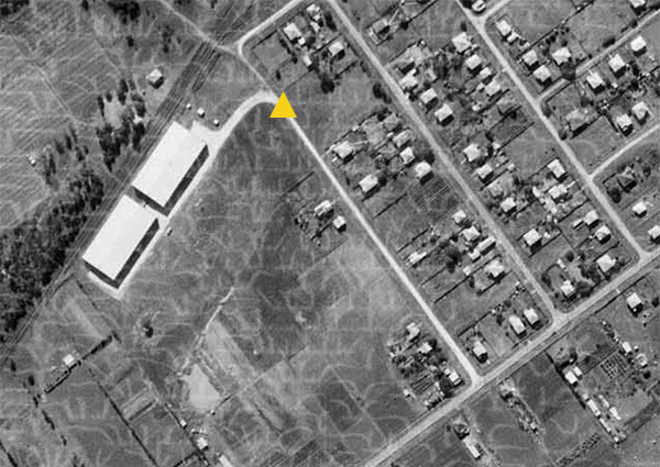 Aerial photo showing relative location of Emoh on St Achs Street and the army warehouses.