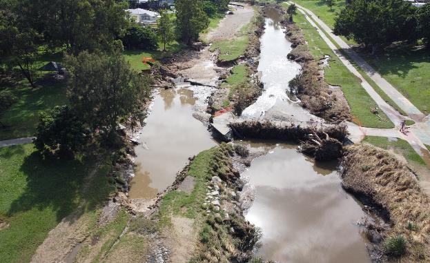 Image: Damage to the creek crossing and northern embankment in Walter Bourke Park