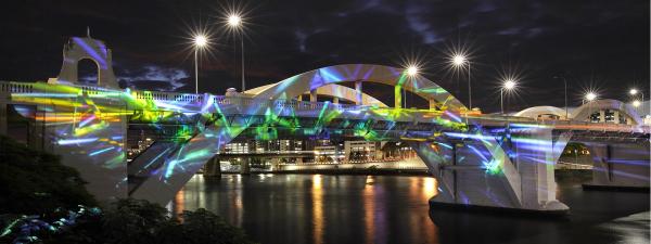 Dichroic Filter Piece by Ross Manning projected onto the William Jolly Bridge from 6-10 July 2019 in celebration of 2019 Brisbane Arts and Culture Innovation