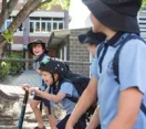 Brisbane school children on scooters